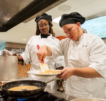 Students cooking in the lab
